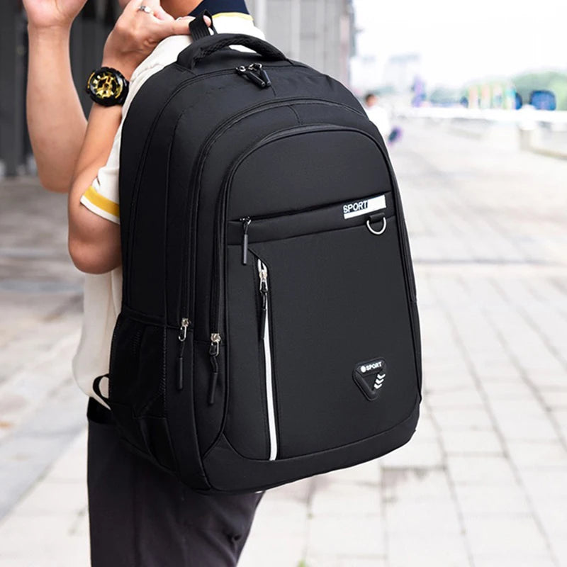 Neutral style backpack for men and women, simple and elegant, large capacity, double shoulder, suitable for travel.